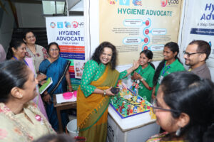 Mrs. Anu Garg, IAS, Development Commissioner of Odisha, and Additional Chief Secretary of the Departments of Water Resources and Planning & Convergence Department in Government of Odisha, interacts with students of Rama Devi Women’s University, Bhubaneswar, during the Knowledge Fair and Symposium on WASH and Climate Change organized by #Di4C
